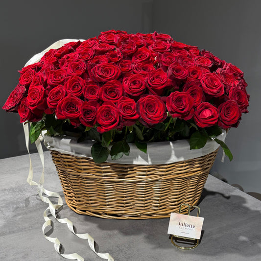 Basket of red roses with delivery in Hamburg