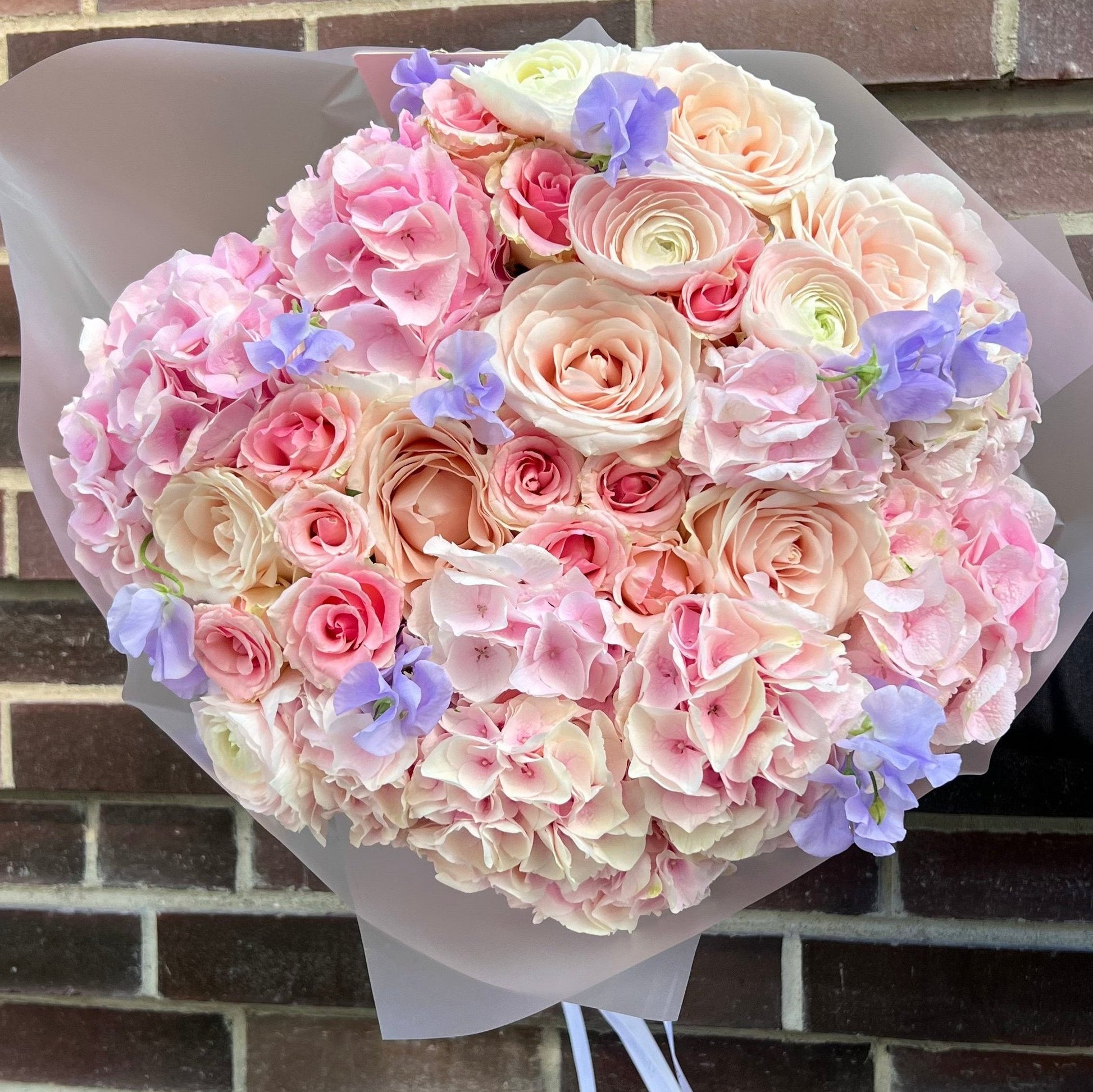 Ranunculus, hydrangeas and avalanche roses